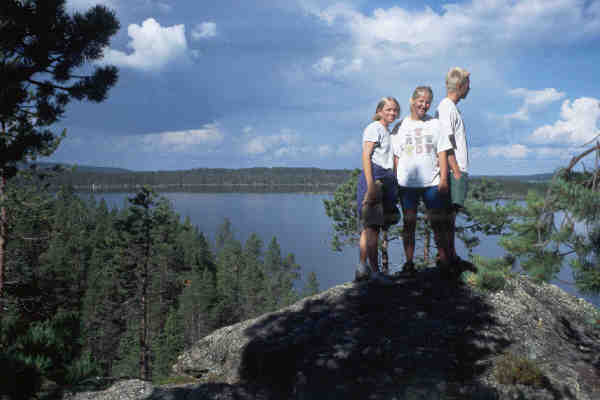 Ruderer auf dem Gipfel am Inari